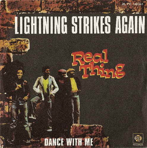 The Real Thing -Lightning Strikes Again / Dance With Me