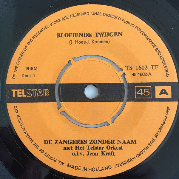 De Zangeres Zonder Naam* -Bloeiende Twijgen