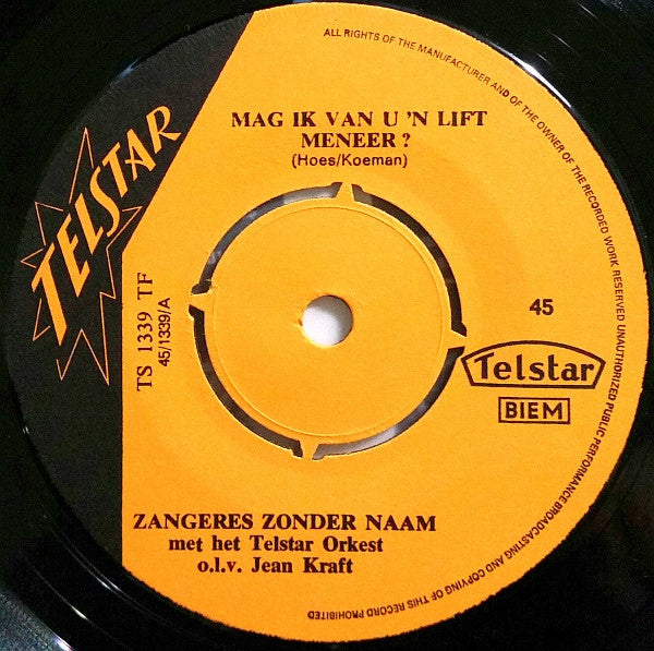 De Zangeres Zonder Naam* -Mag Ik Van U 'n Lift, Meneer? / Het Stiefkind